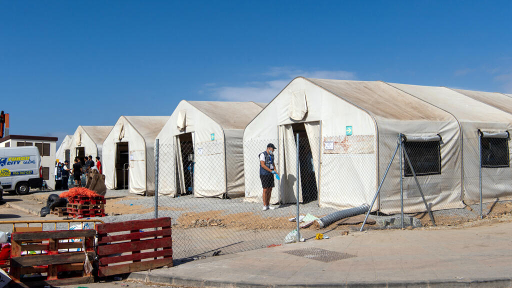 This picture shows large tents at the new Los Rosales migrant reception camp, where more than 800 people have been transferred from the Loma Colmenar camp, in Ceuta, on September 12, 2026